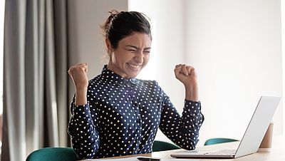 Happy international woman receiving approval from the Federal Employment Agency