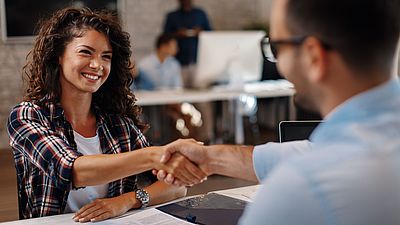 International young woman signing a contract in Germany