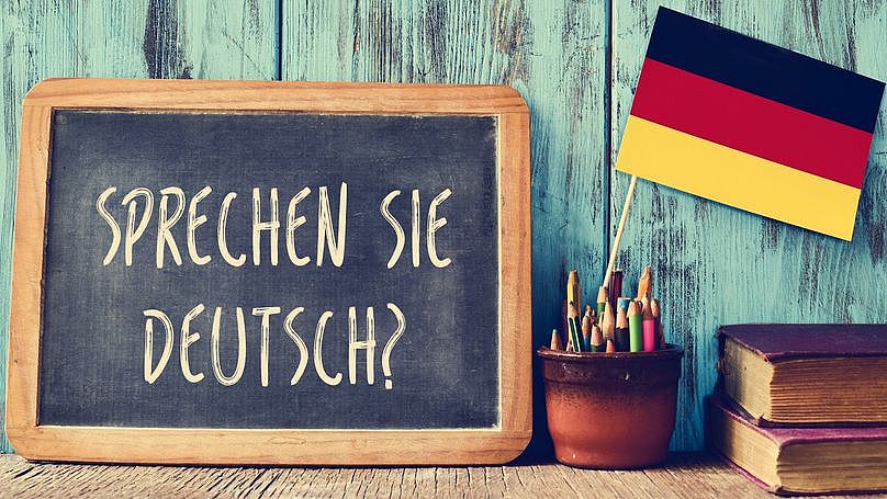 German flag next to chalk board