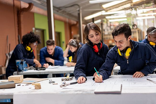 International students working on a trainee project