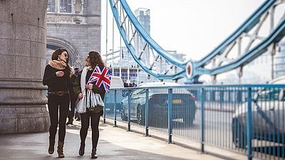 Two women walking in London