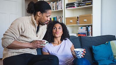 International couple in the living room