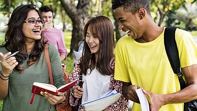 Happy group of students outdoors